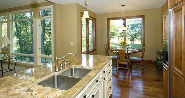 Bright Breakfast Nook with a Bay Window and Nature Views