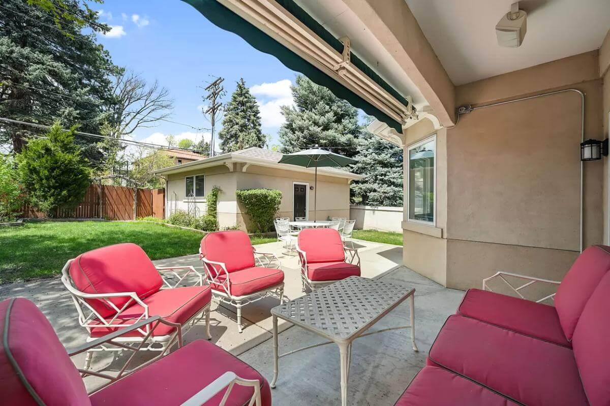 Relax on This Patio with Vibrant Red Cushions