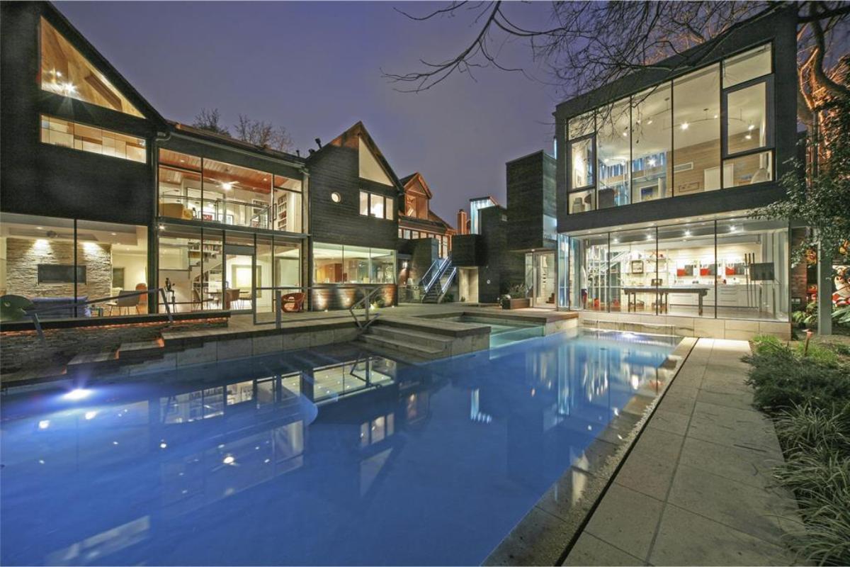 Expansive Glass Walls Overlooking a Stunning Pool