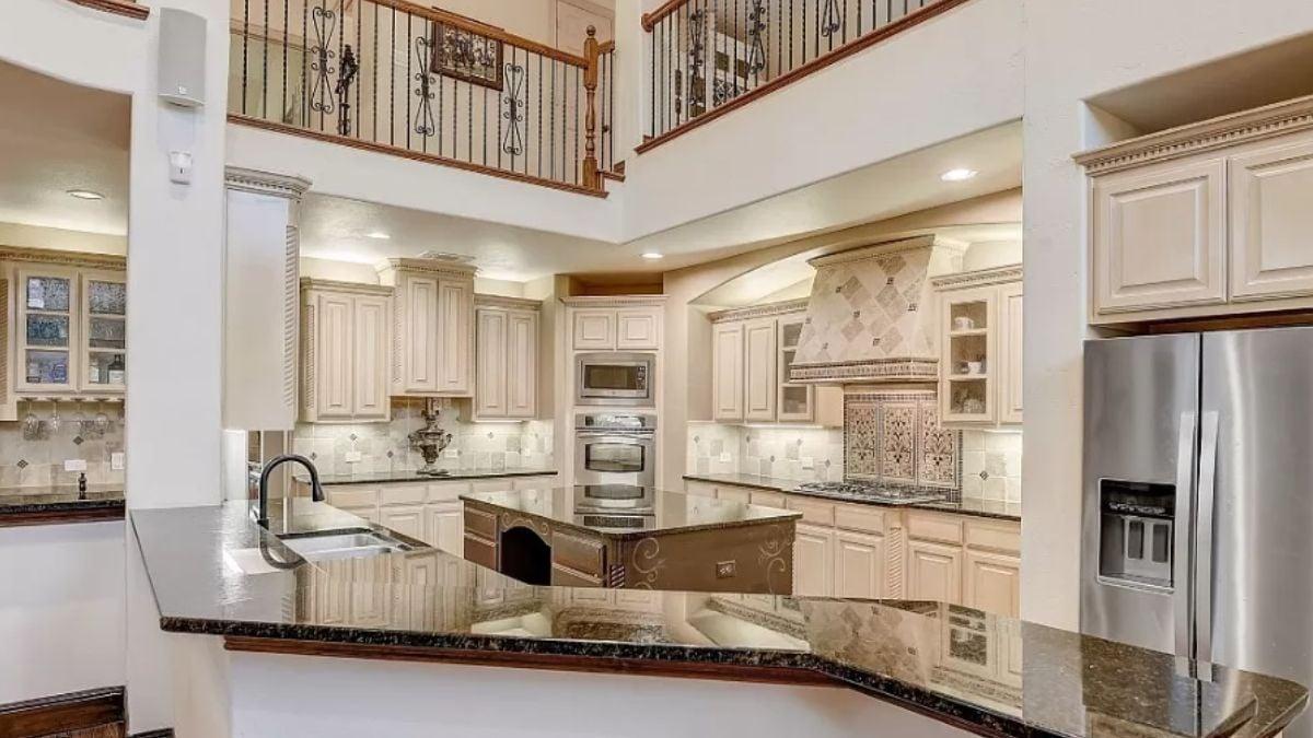 Wow, Notice the Ornate Range Hood in This Spacious Kitchen