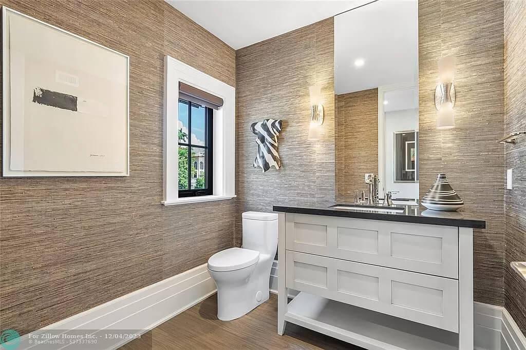 Check Out the Textured Grasscloth Walls in This Chic Powder Room