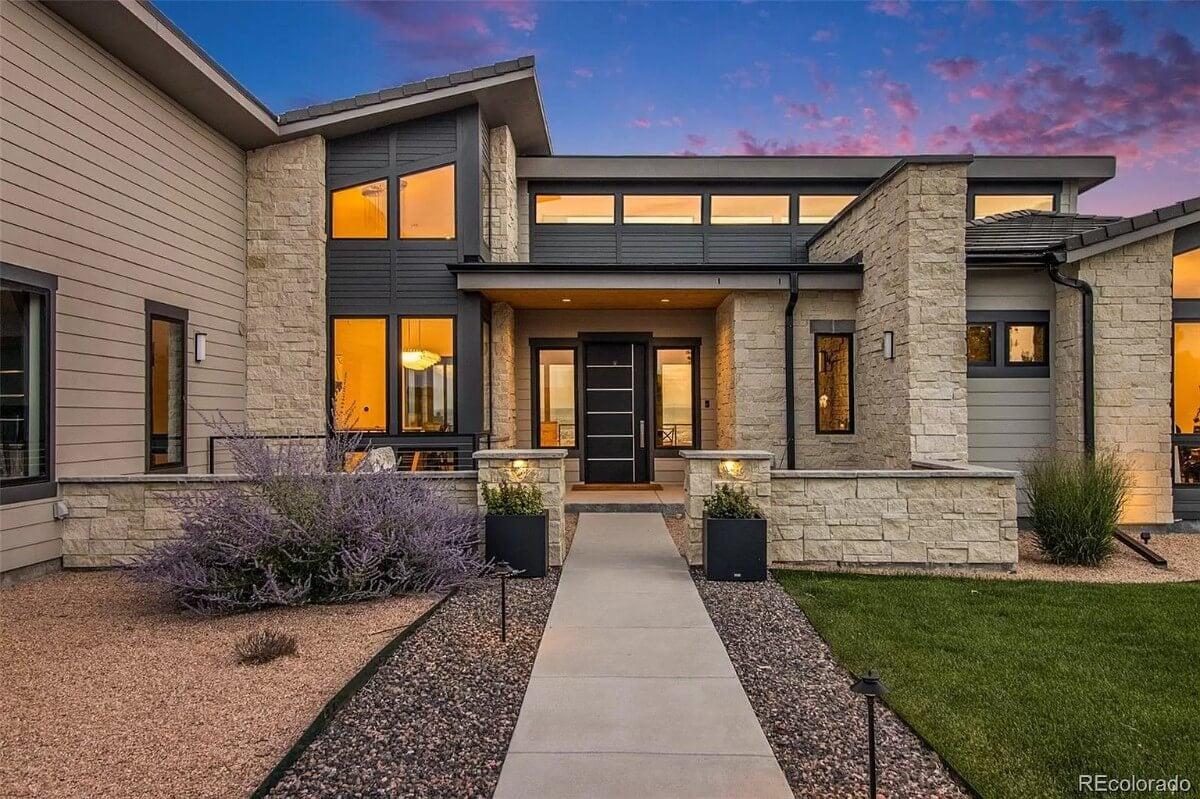 Striking Entry with Stone Facade and Sleek Lines