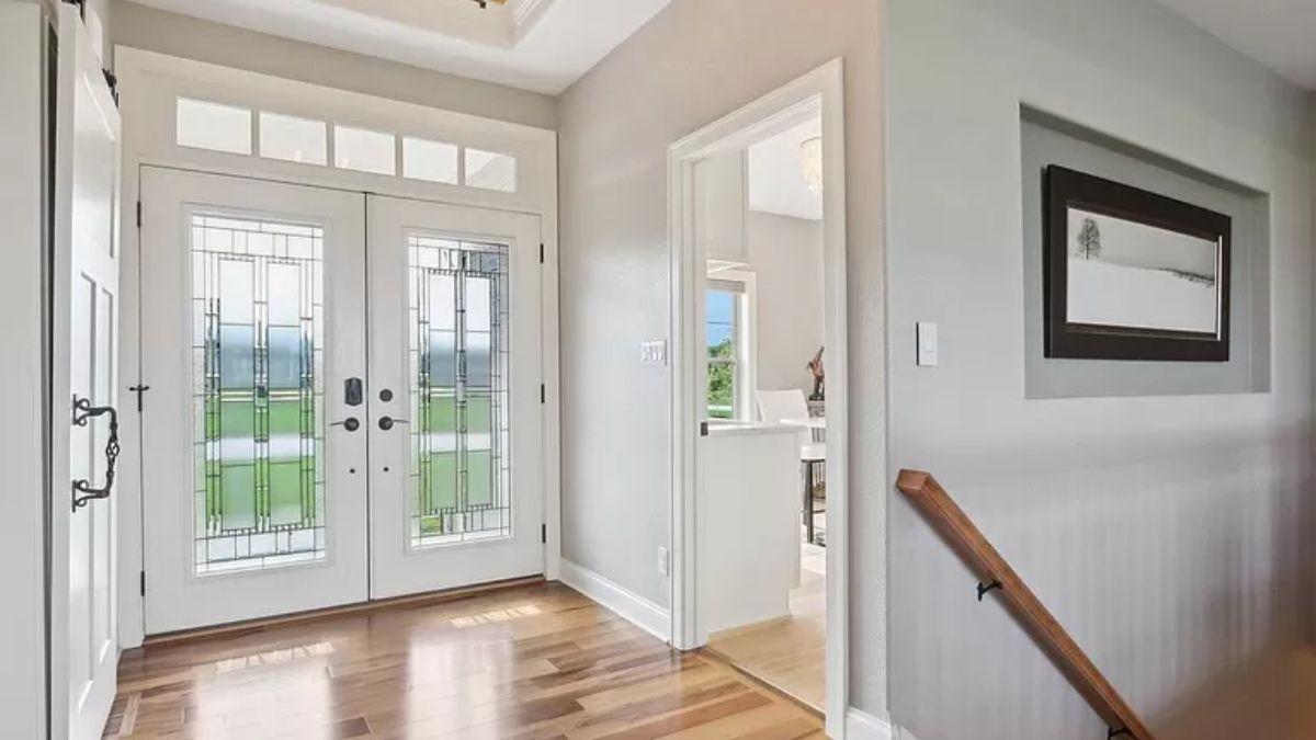 Take a Peek at the Elegant Entryway with Stained Glass Doors