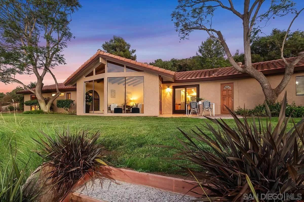 Enjoy the Expansive Glass and Terracotta Roof in This Ranch-Style Home