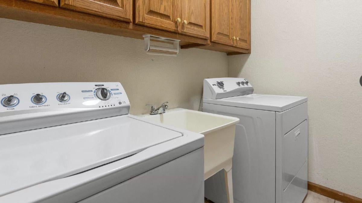 Functional Laundry Room with Classic Oak Cabinetry