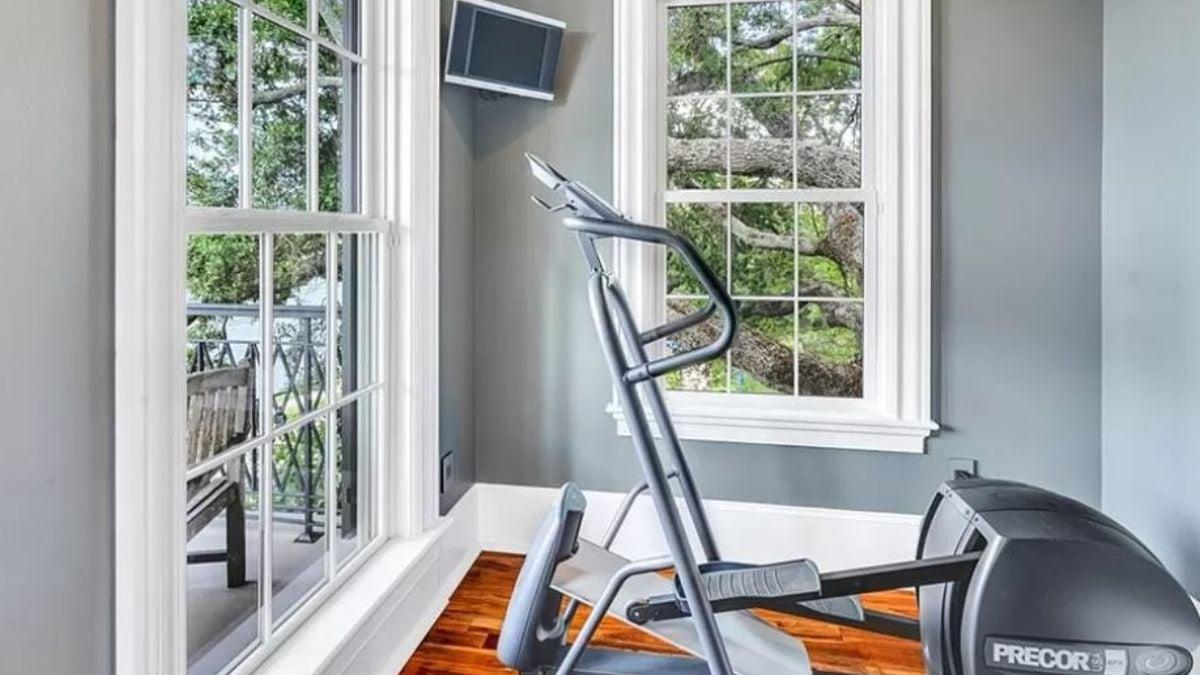 Check Out This Bright Home Gym with Tree-Filled Views