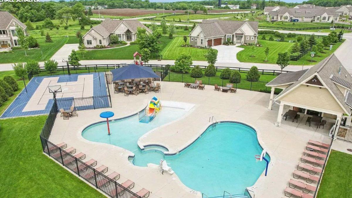 Check Out the Inviting Pool and Sport Court in This Community Space