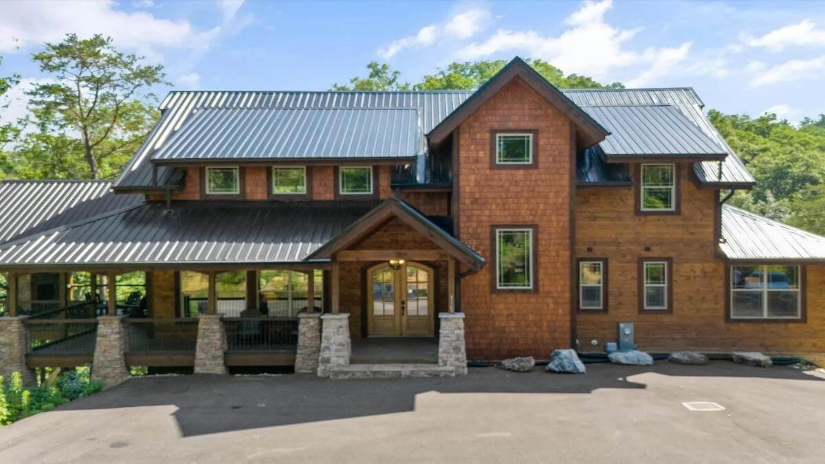 Bold Rooflines and Stone Columns Define This Craftsman Retreat