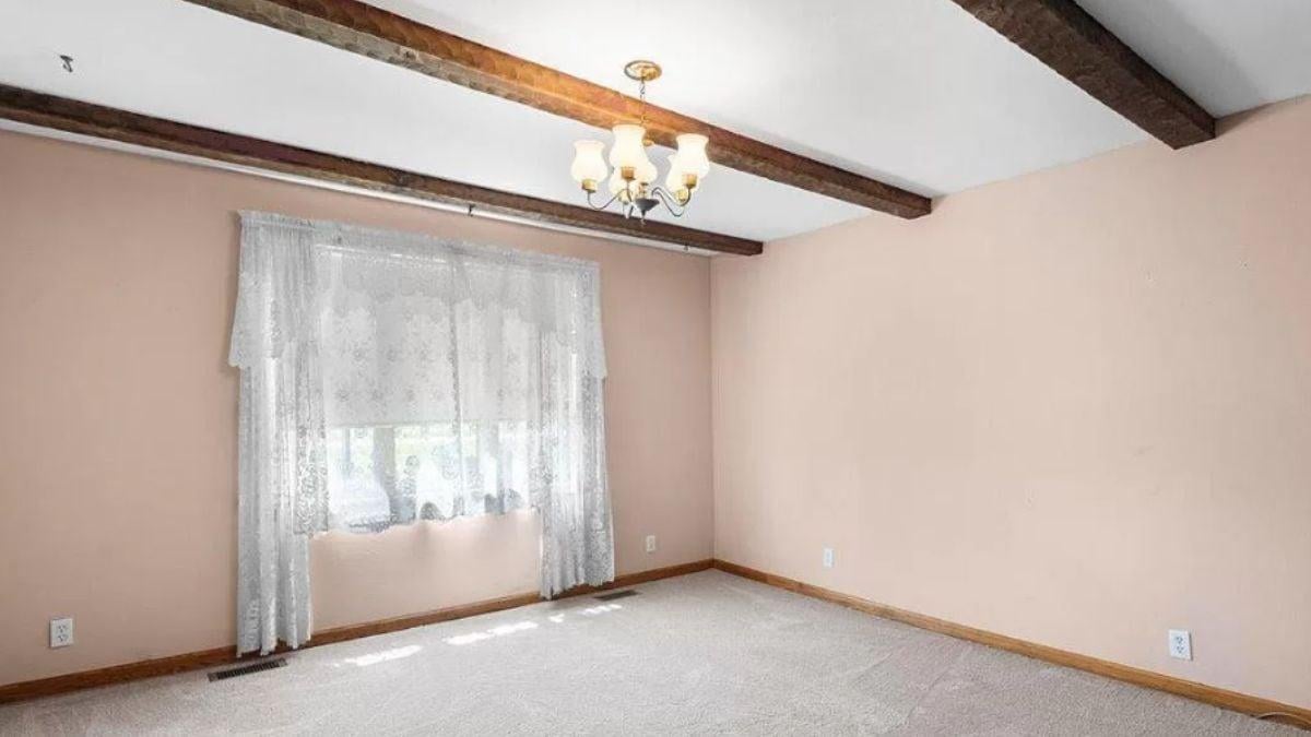 Look at the Exposed Beams in This Vintage Farmhouse Room