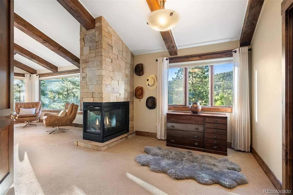 Modern Rustic Sitting Room with Dual-Sided Fireplace