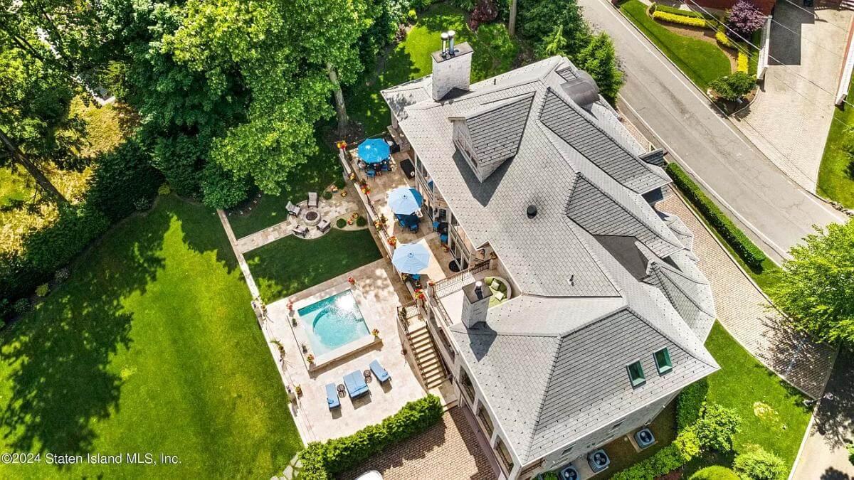 Check Out This Aerial View with Its Spacious Patio and Pool
