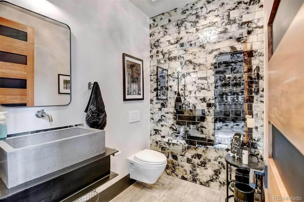 Industrial Bathroom with Unique Textured Wall Tiles
