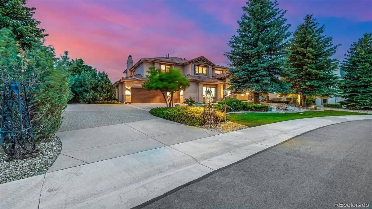 Stunning Evening View of a Modern Craftsman Home Nestled Among Pines