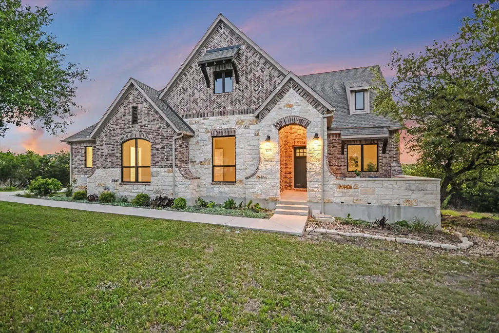 Modern 4-Bedroom Tudor Home with Loft and 3-Car Angled Garage (3,992 Sq. Ft. Floor Plan)