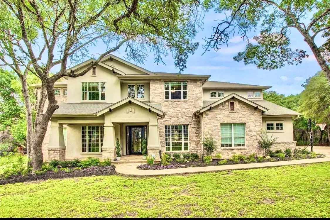 Transitional-Style 5-Bedroom Hill Country Home with Custom Wet Bar and Multiple Level Deck (5,587 Sq. Ft. Floor Plan)