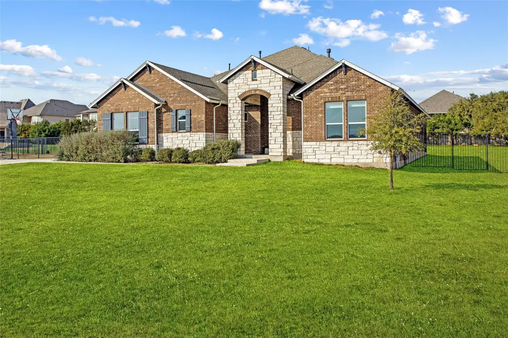 Traditional 5-Bedroom Ranch-Style Home with Open Floor Plan and 3-Car Angled Garage (3,815 Sq. Ft. Floor Plan)