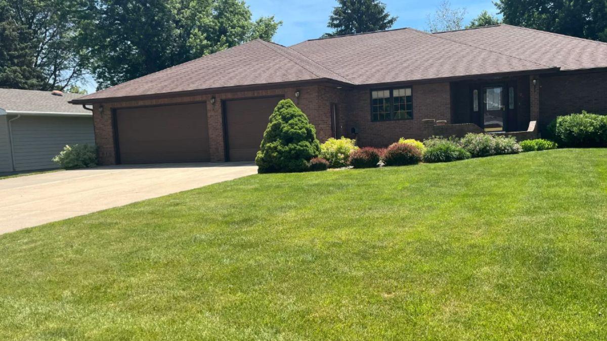 Brick Ranch with Manicured Lawn and Welcoming Entryway
