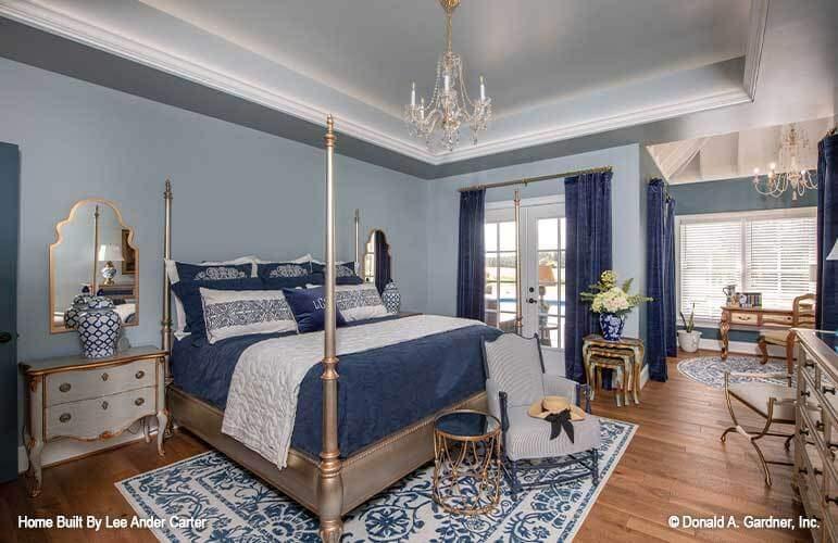 Luxurious Master Suite with a Captivating Tray Ceiling