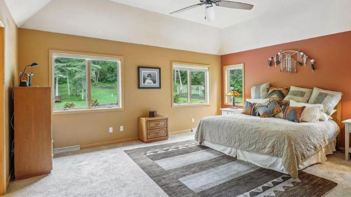 Cozy Bedroom with Earthy Tones and Natural Views