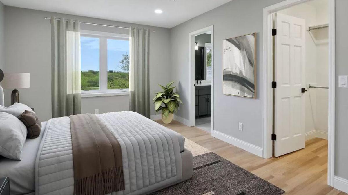 Serene Bedroom with a View and Modern Art Touch