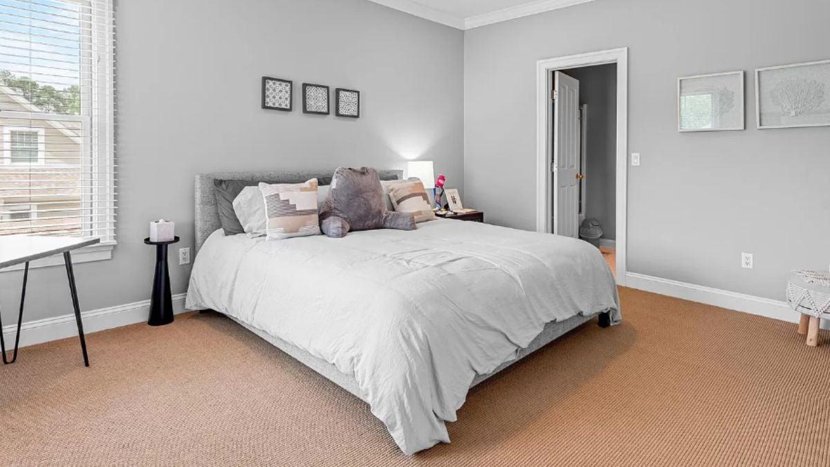 Neutral Bedroom Oasis with Soft Textures and Natural Light