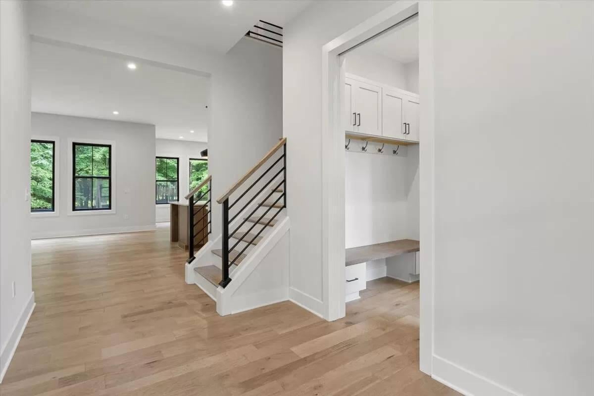 Sleek Staircase with Modern Railings in the Craftman Home