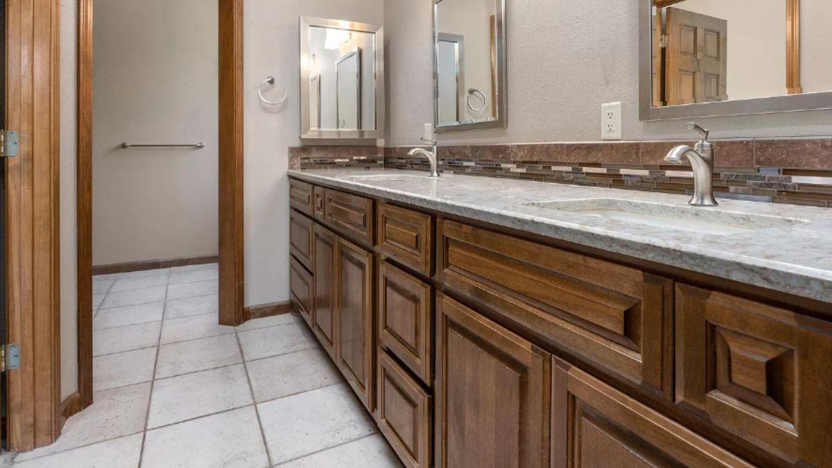 Warm Bathroom with Dual Sinks and Rustic Charm