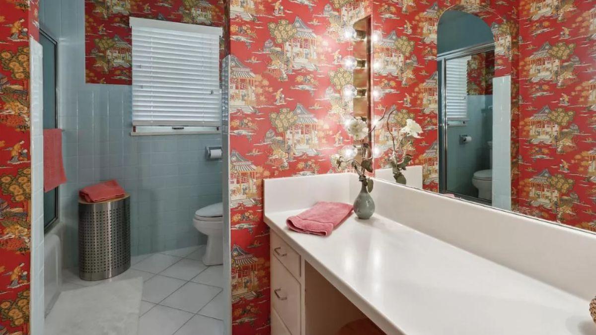 Notice the Bold Red Wallpaper in This Retro Bathroom