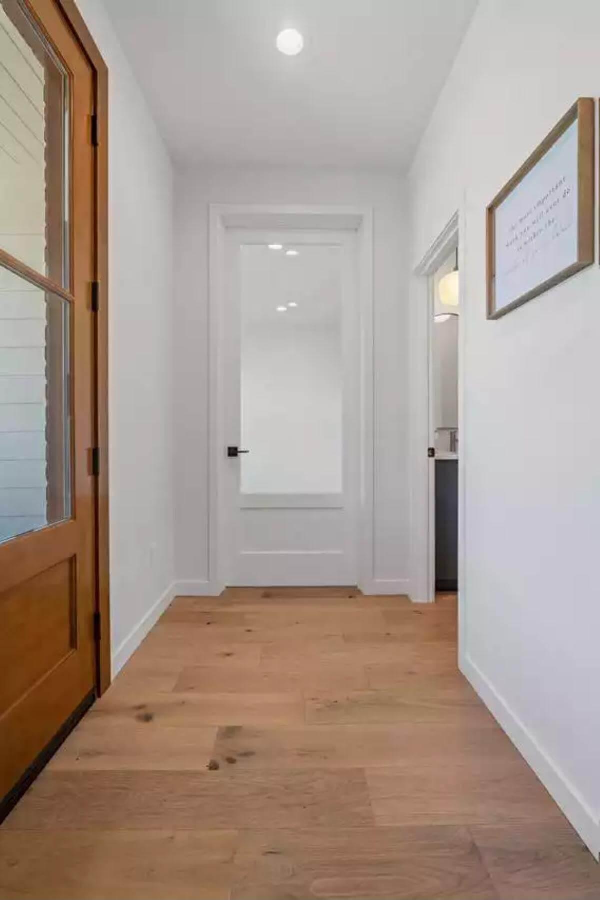 Step Inside: Exploring a Seamless Entryway and Light Wood Floors