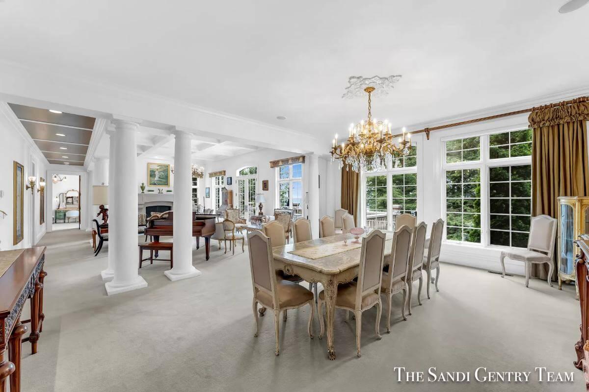 Step into This Grand Dining Room with Its Gleaming Chandelier