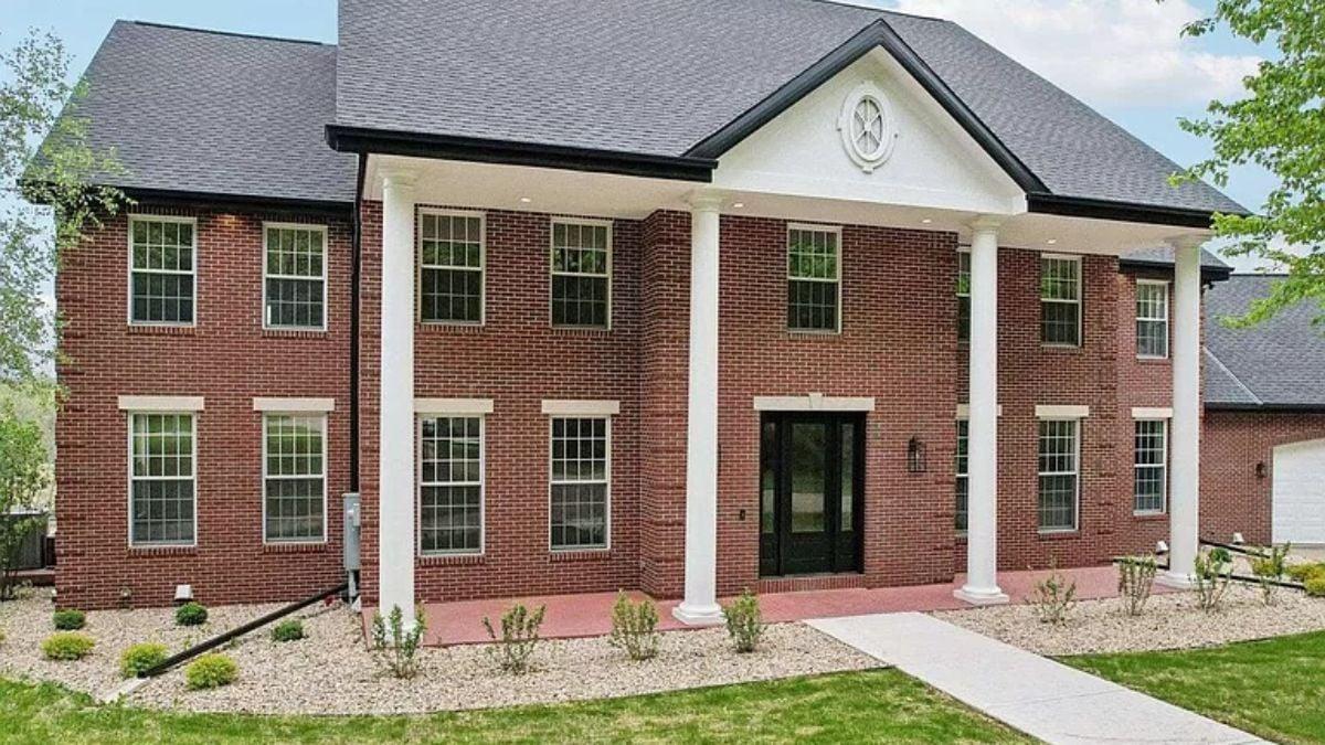 Classic Red Brick Facade with Stately Columns