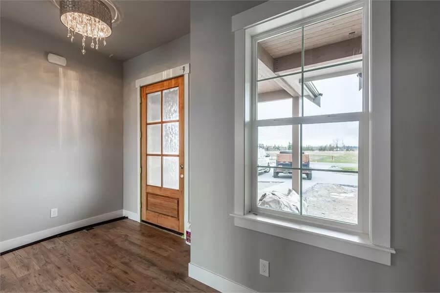 Check Out This Craftsman Entry Nook with Striking Chandelier