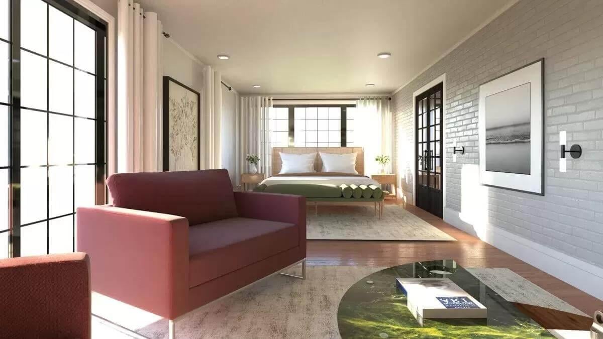 Modern Bedroom Suite with Exposed Brick and Cozy Sitting Area