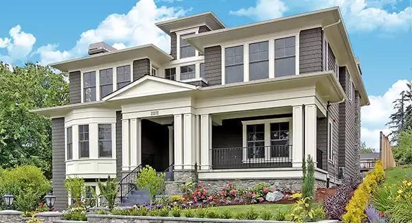 Craftsman Elegance with a Fresh Facade and Charming Bay Windows