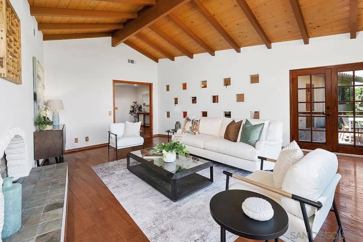 Check Out the Unique Cut-Out Details in This Vaulted Living Space