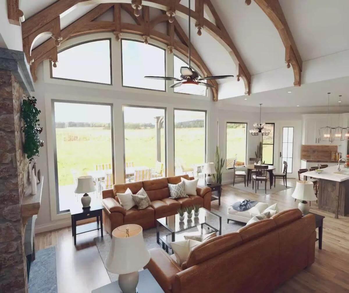 Admire the Timber Trusses in This Vaulted Ceiling Living Space