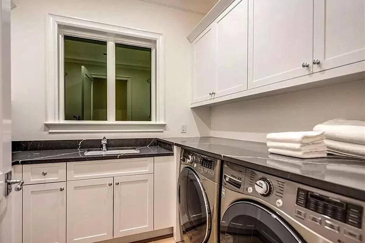 Practical Laundry Room with Sleek Black Countertop