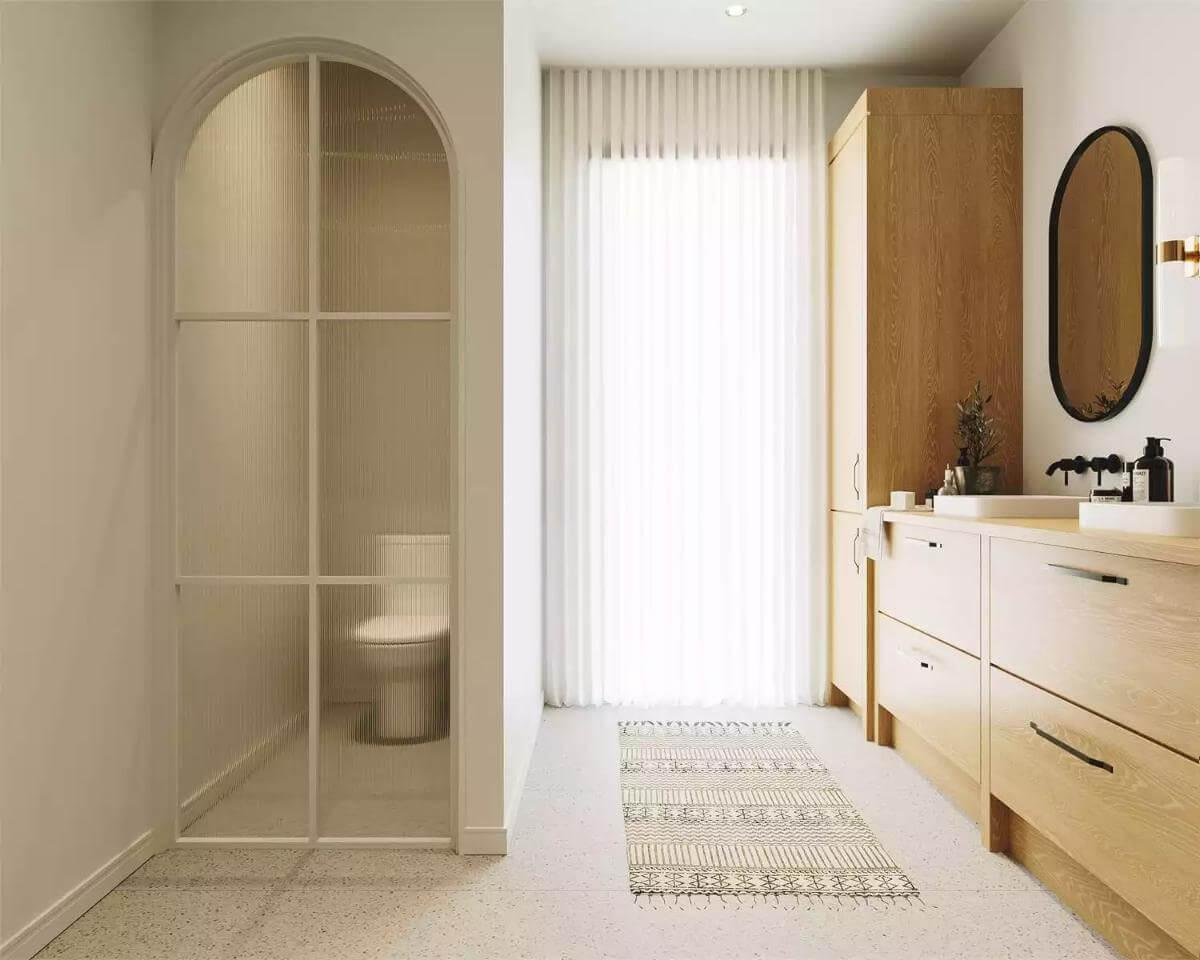 Minimalist Bathroom with an Elegant Arched Glass Door
