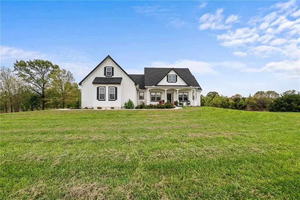 3-Bedroom Traditional Farmhouse with Loft and 3-Car Garage (1,878 Sq. Ft. Floor Plan)