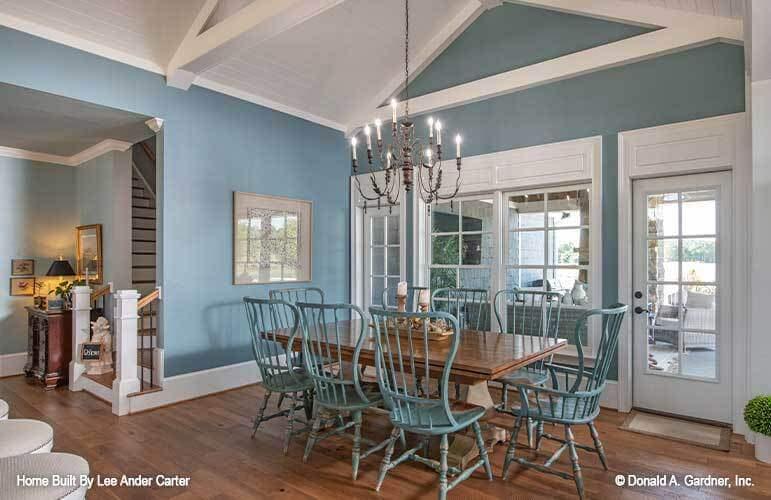 Elegant Dining Room with Sky-High Ceilings and Rustic Charm