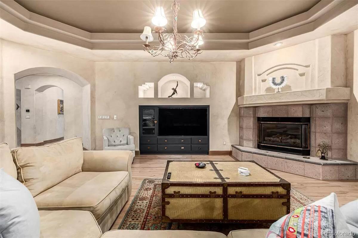 Living Room with Rustic Charm and Cozy Fireplace