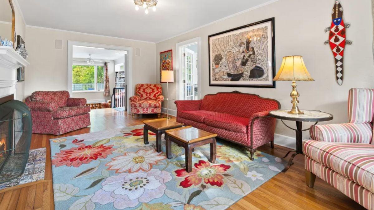 Eclectic Living Room with Vibrant Patterns and a Cozy Fireplace