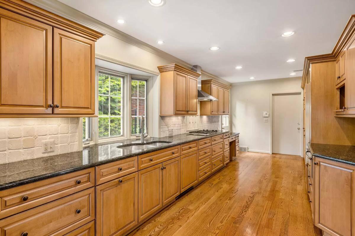 Discover the Timeless Charm of This Classic Kitchen with Wooden Cabinetry