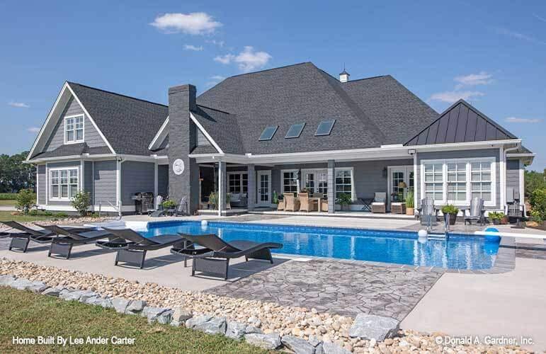 Relax by the Pristine Pool Under the Expansive Covered Patio