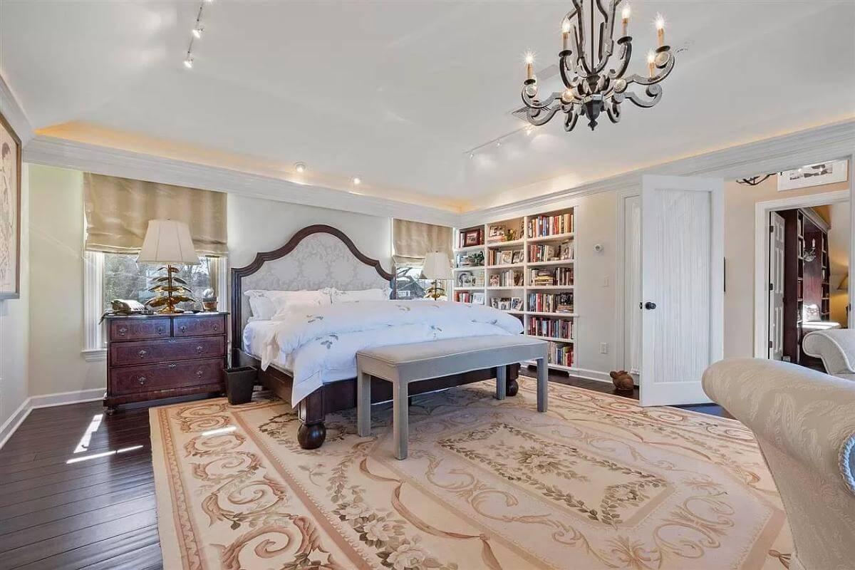 Elegantly Appointed Bedroom with Built-In Bookshelves