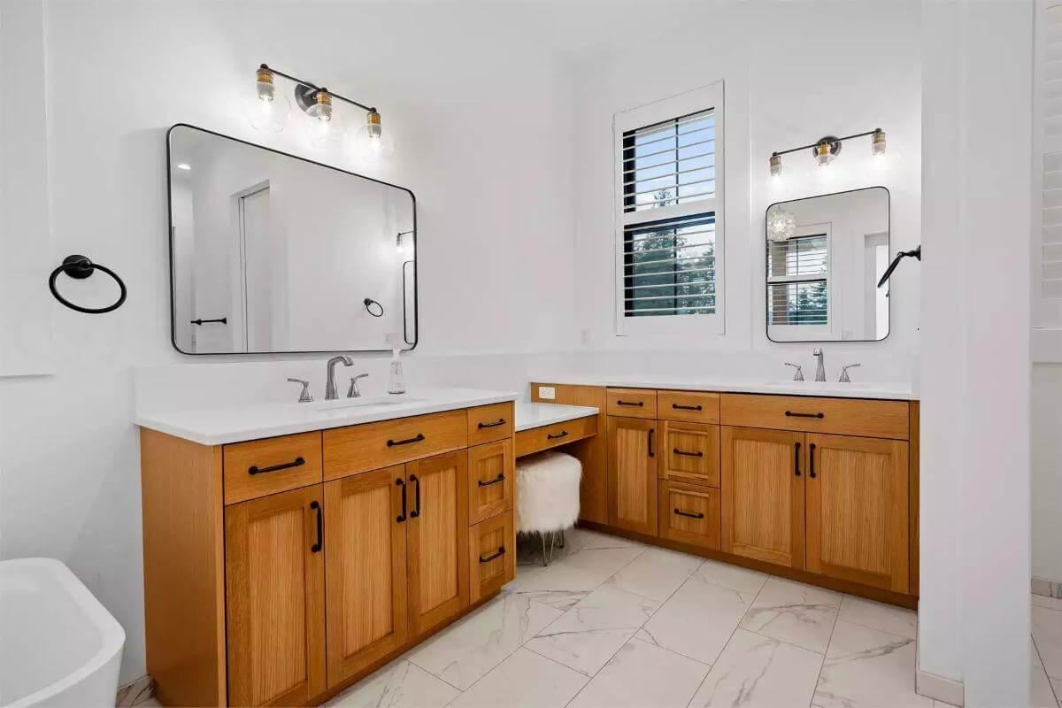 Check Out the Double Vanity with Wood Accents in This Bathroom