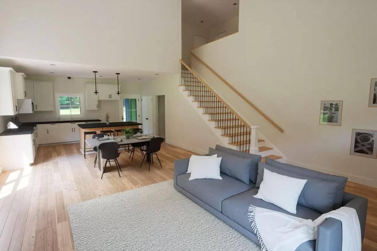 Lofty Open Design with a Floating Staircase Feature