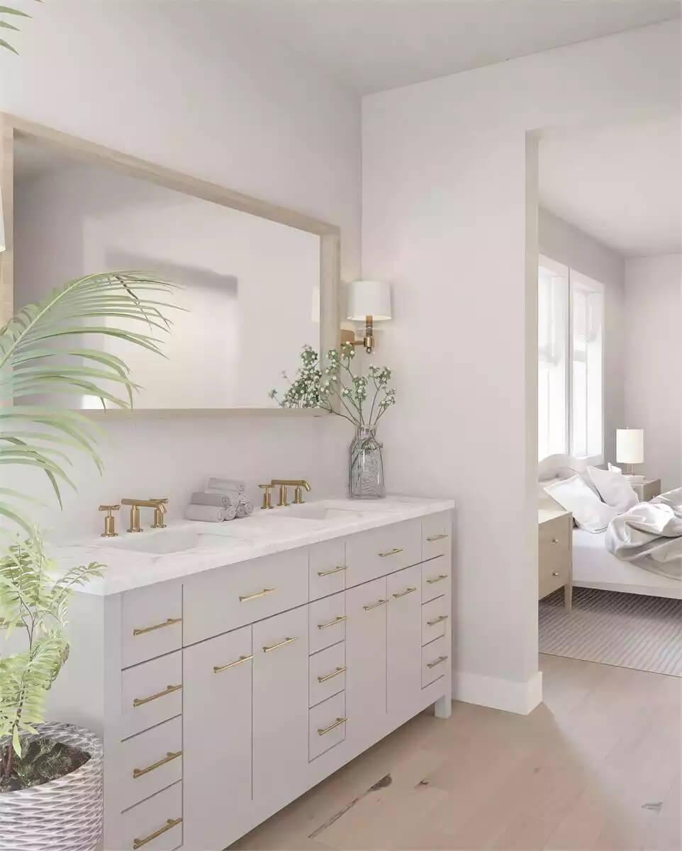 Check Out the Gold Accents in This Tranquil Bathroom Vanity