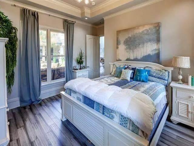 Check Out the Tranquil Bedroom with Soft Blue Accents