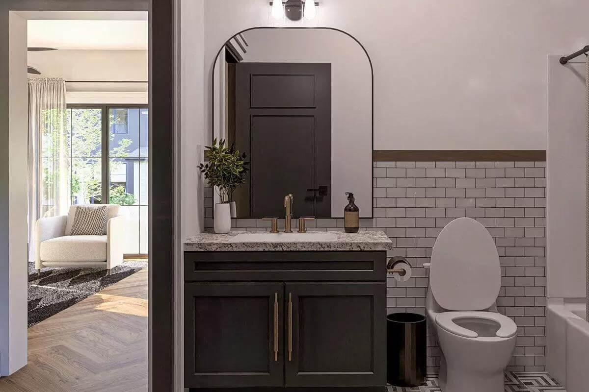 Classic Bathroom Charm with Subway Tile and Granite Vanity